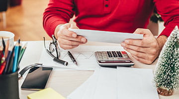 An entrepreneur at the site of a renovation