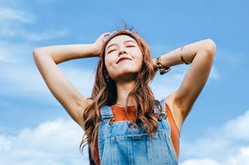Woman feeling much less stress after working with Money Management International